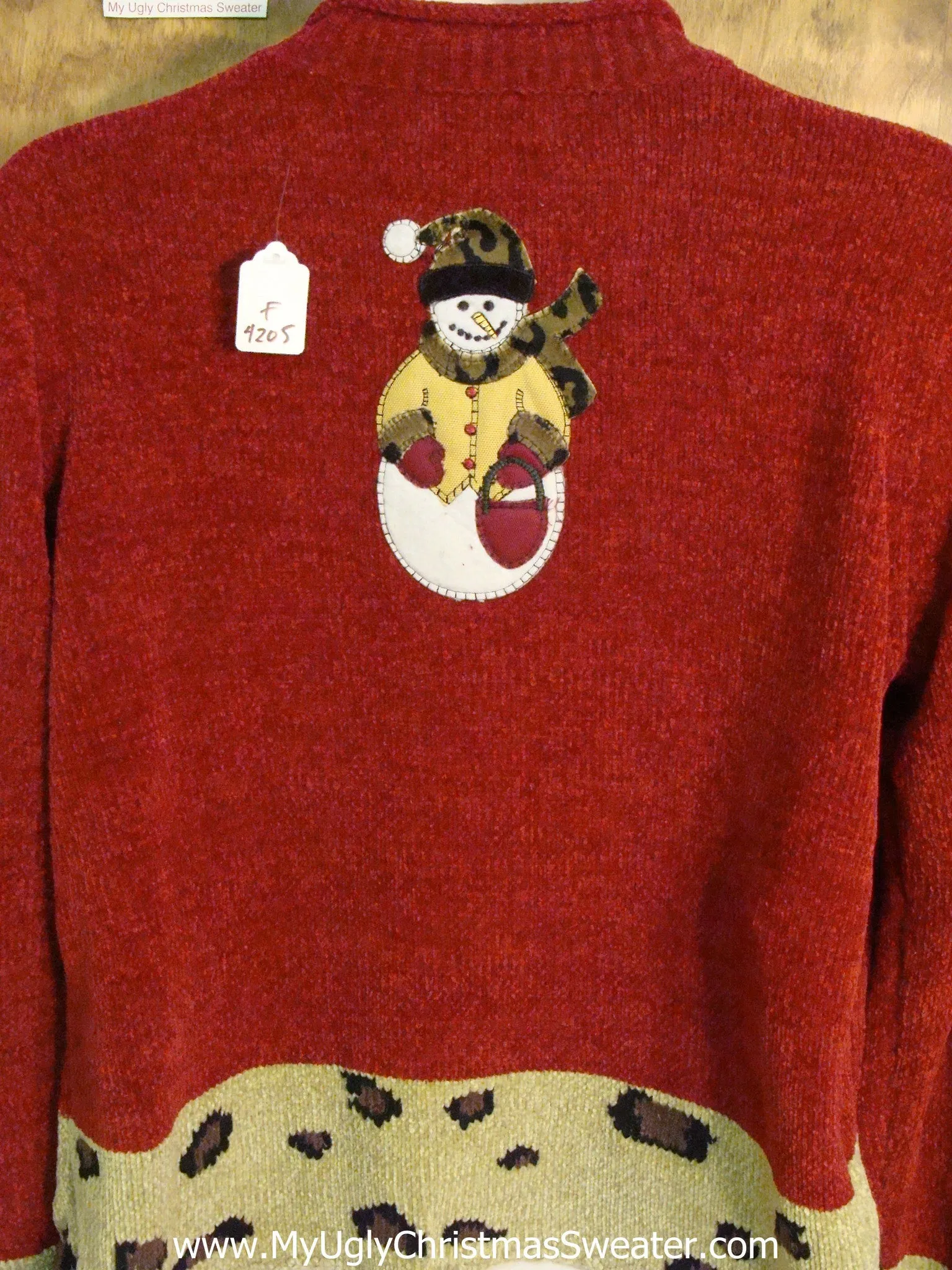 Snowmen Wearing Animal Prints Ugly Christmas Sweater