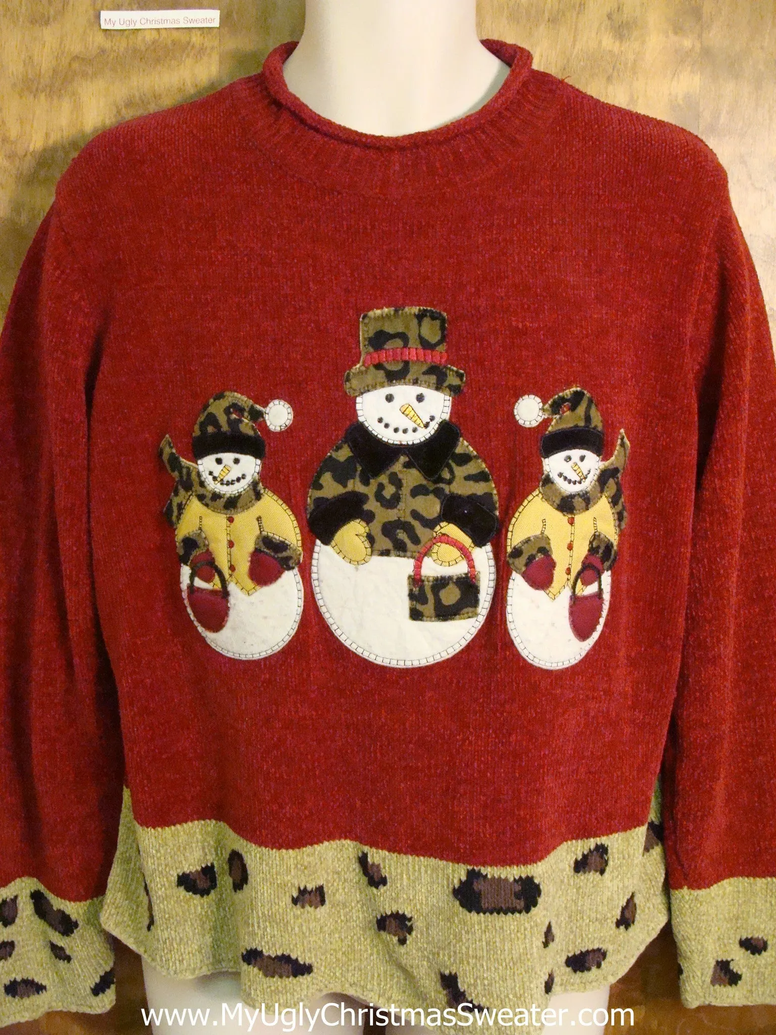 Snowmen Wearing Animal Prints Ugly Christmas Sweater